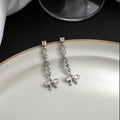 Clear Bow Silver Tone Long Line Dangle Stud Earrings view 2