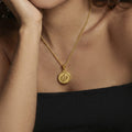 Wing and Floral Round Medallion Necklaces in Gold Tone view 4