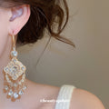 Ornate Gold Tone Chandelier Earrings with Clear Crystal Drops view 3