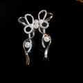 Bow Crystal Tassel Clip On Earrings in Two Designs view 7