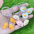 Three Charm Dumpling Egg Coffee Bean and Fish Cake Keychains view 2