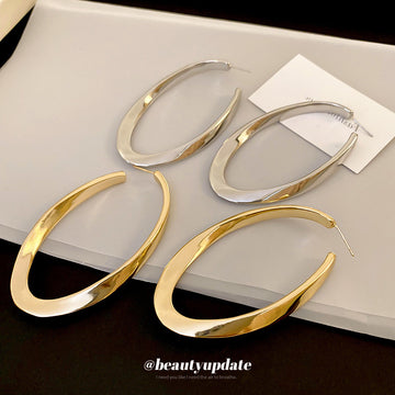 Slim Elongated Oval Hoop Earrings in Gold and Silver Tones