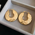 Sculpted Open Hoop Earrings In Gold And Silver Tones view 6