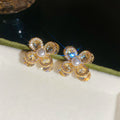 Gold Tone Crystal Petal Flower Stud Earrings With Pearl Centers view 6