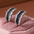 Blue And Black Crystal Textured Huggie Earrings With Clear Stone Accents view 3