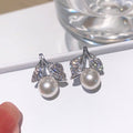 Faux Pearl Leaf Stud Earrings Gold Tone and Silver Tone view 1