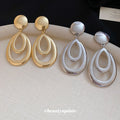 Layered Open Teardrop Earrings in Gold and Silver Tone view 4