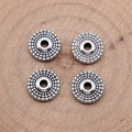 Dotted Round Wheel Spacer Beads in Two Antique Metal Finishes view 2
