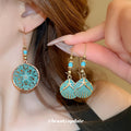 Green Patina Openwork Floral Disc Statement Hook Earrings view 2