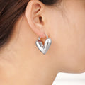 Gold and Silver Tone Heart Huggie Earrings Polished Jewelry Accessory view 3