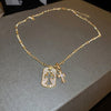 Gold Dog Tag Cross