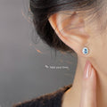 Silver Tone Pale Blue Oval Stone And Clear Floral Halo Stud Earrings view 2