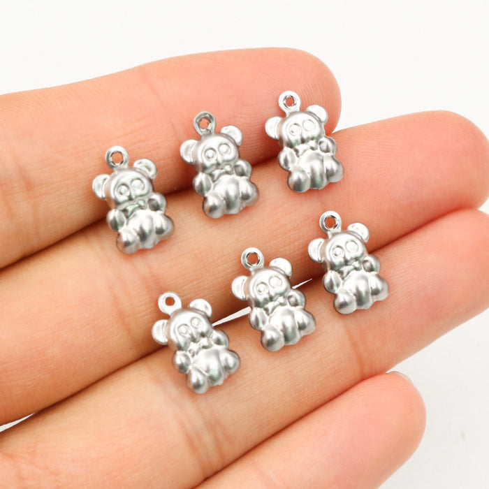 Tiny Hollow Bear Stainless Steel Charms in a Silver Tone