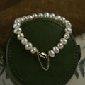 White Freshwater Pearl Bracelet With Gold Tone Barrel Clasp view 1