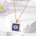 Gold Tone Blue Enamel Evil Eye Necklace and Hook Earring Options view 2
