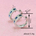 Silver Tone Blue And Clear Stone Wide Huggie Earrings view 4