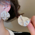 Irregular Folded Disc Stud Earrings in Gold and Silver Tones view 3