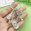 Guitar, Piano and Music Note Charm Keychains Featuring Sax Cassette Across 25 Variations view 1