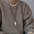 Silver Fish Pendant Necklace On Black Cord Pendant Jewelry view 1