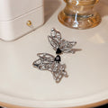 Silver Butterfly and Black Heart Mismatched Stud Earrings view 3