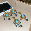 Gold Tone Blue Cabochon And Teardrop Chandelier Earrings view 4