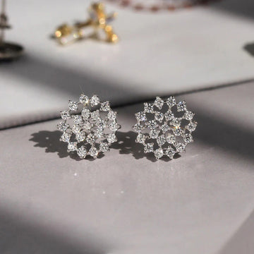 White Gold Tone Openwork Snowflake Clear Stone Stud Earrings