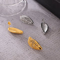 Shell-Shaped Ribbed Stud Earrings Rhinestones Gold Steel view 3