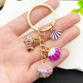 Nine Colorful Ocean Animal and Mermaid Metal Keychain Designs view 4