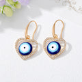 Gold Tone Crystal Heart Star and Evil Eye Hook Earrings view 7