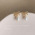 Gold Freshwater Pearl Bow Flower Wave And Spiral Earrings view 6