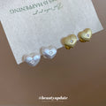 Gold Tone Heart Stud Earrings With Starburst Crystals view 2