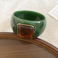 Acrylic Wide Bangle with Square Gold-Framed Cabochon view 2