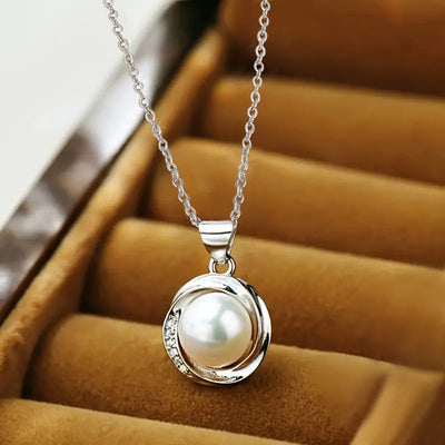 Alternate tray shot of silver geometric faux pearl pendant necklace