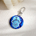 Silver Tone Round Printed Hamsa Eye Clip Keychains in Eight Designs view 6