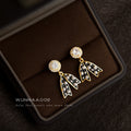 Gold Tone Black Enamel Bow And Pearl Drop Earrings With Clear Stone view 3