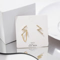 Gold Pavé Lightning Bolt Asymmetric Stud Earrings Chain Drop view 2