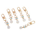 White Enamel Butterfly Evil Eye Letter Charm Gold Keychain view 5