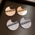 Half Moon Textured Disc Stud Earrings in Gold with Polished Details view 3