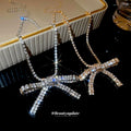 Crystal Bow Pendant Necklaces in Gold and Silver Tones view 2
