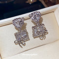 Geometric Crystal Bow Stud Earrings Statement Jewelry Design view 1