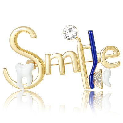 Front view of the smile letter brooch showing gold-tone Smile lettering with a vertical colored bar and clear crystals