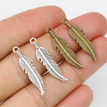 Curved Feather Charms in Antique Bronze and Silver view 1