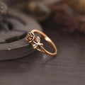 Small Rose And Leaf Ring In Three Polished Metal Tones view 3