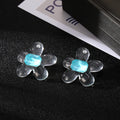 Clear Resin Flower Stud Earrings with Faceted Centers in Three Colors view 4