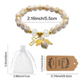 White Cross Bead Bracelet with Gold-Tone Cross and Angel Wing Charms view 4