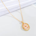 Gold Tone Oval Abstract Floral Pendant Necklaces in Five Colors view 4