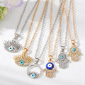 Gold and Silver Tone Crystal Evil Eye and Hamsa Necklaces view 1