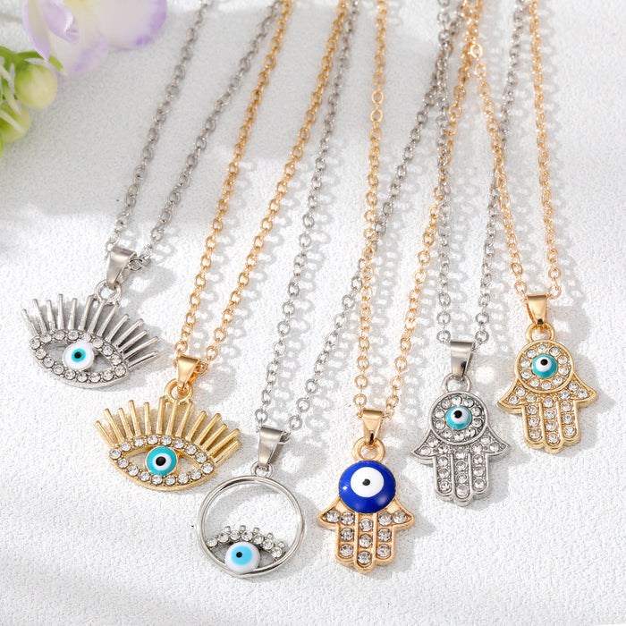 Gold and Silver Tone Crystal Evil Eye and Hamsa Necklaces