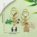 Panda Charm Keychains Featuring White Apple Across 45 Pictured Variations view 12