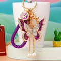 Jeweled Butterfly Keychains in Four Colors with Pearl Drop Tassels view 2